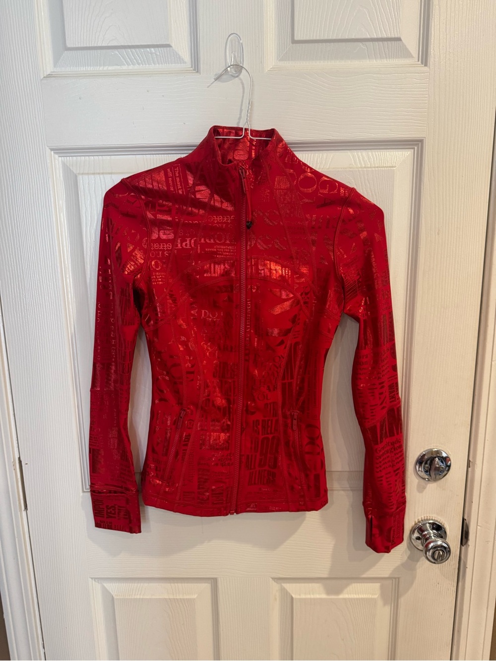 Size 4 Lululemon Define jacket 20 year manifesto. Dark red. Foil.